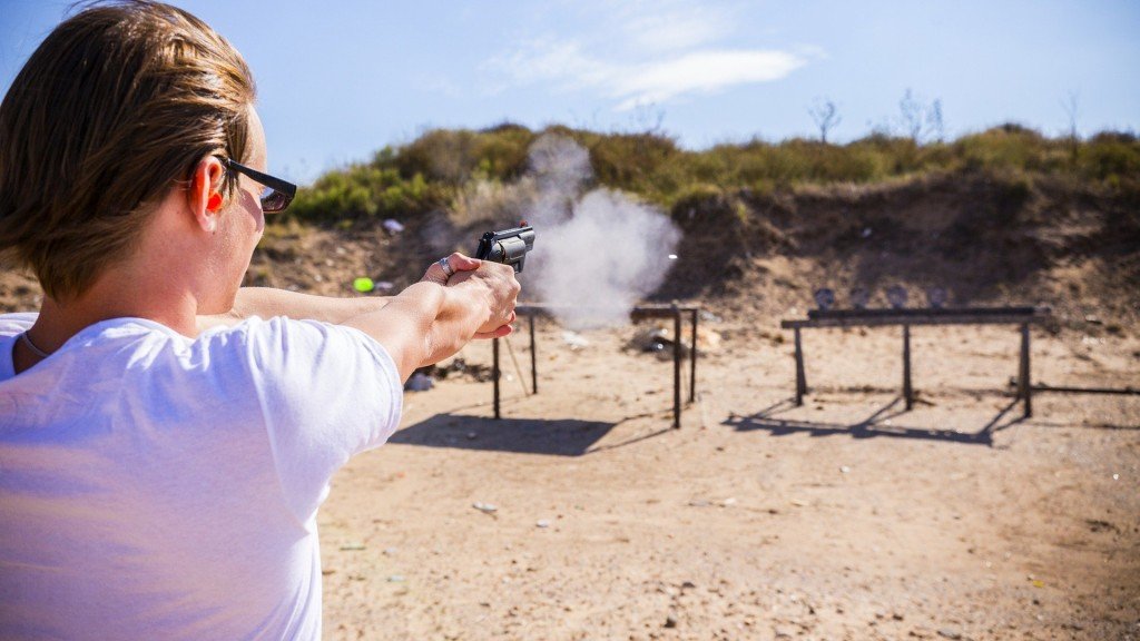 elbow pain treatment - pistol gun shooting range sports physiotherapy